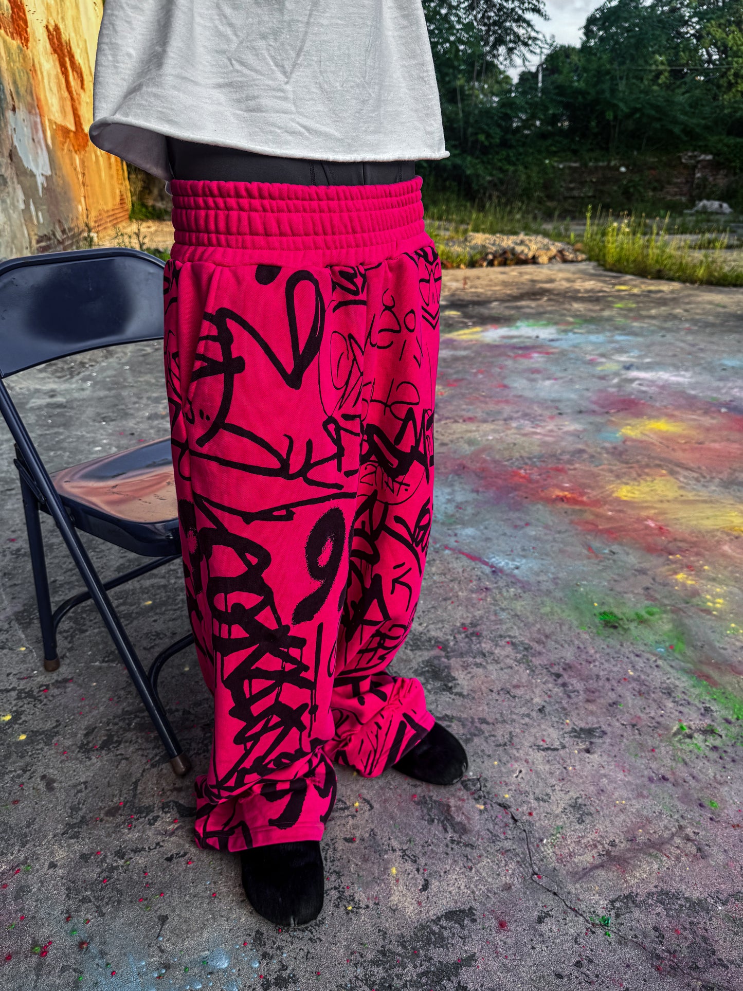 Pink Vandalizm Sweats featuring black graffiti print, ultra-heavyweight French terry cotton, styled with an extra baggy fit.