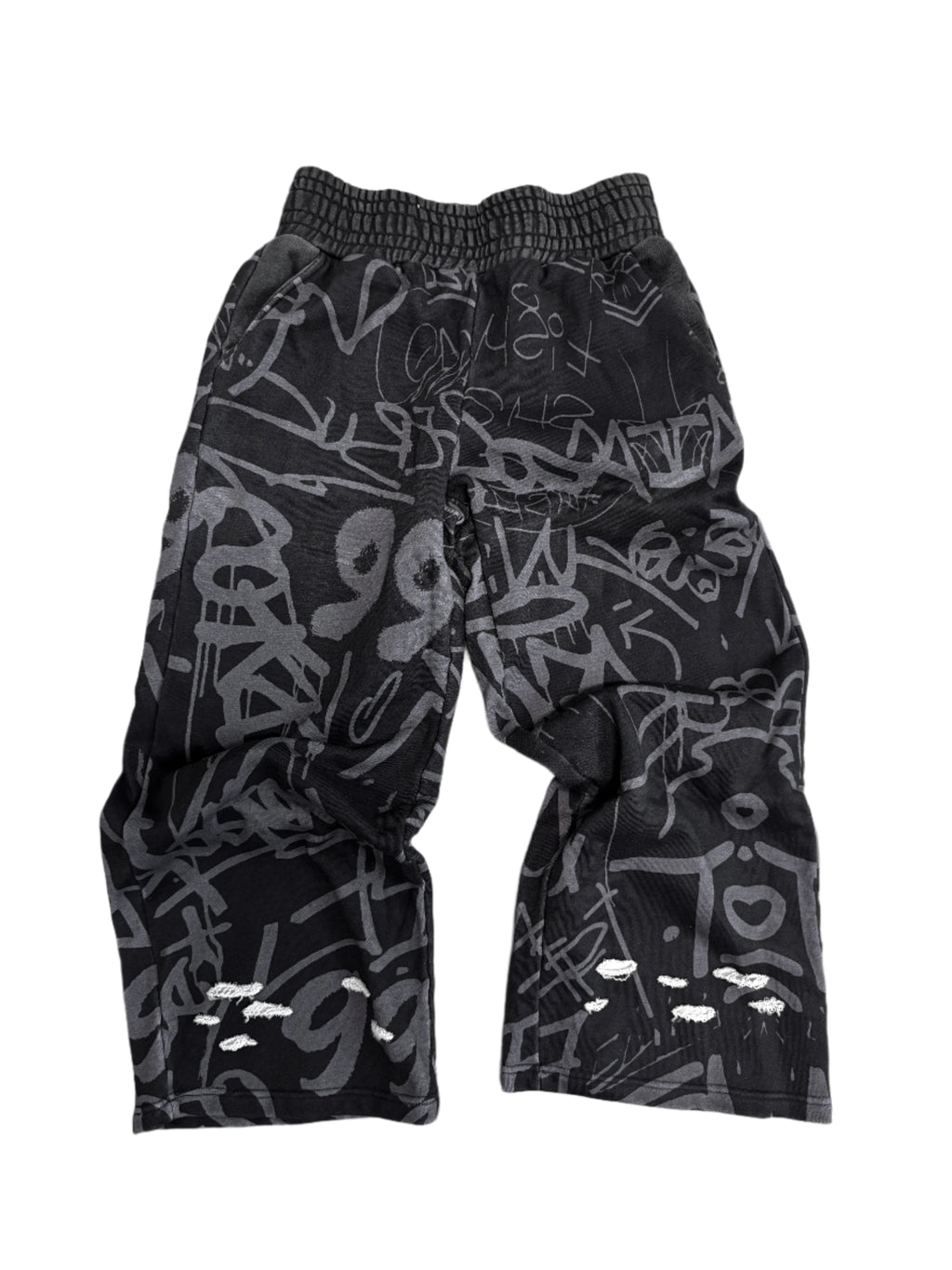 Black Vandalizm Sweats featuring graffiti print, made from 100% French Terry Cotton, ultra-heavyweight style.