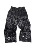 Black Vandalizm Sweats featuring graffiti print, made from 100% French Terry Cotton, ultra-heavyweight style.