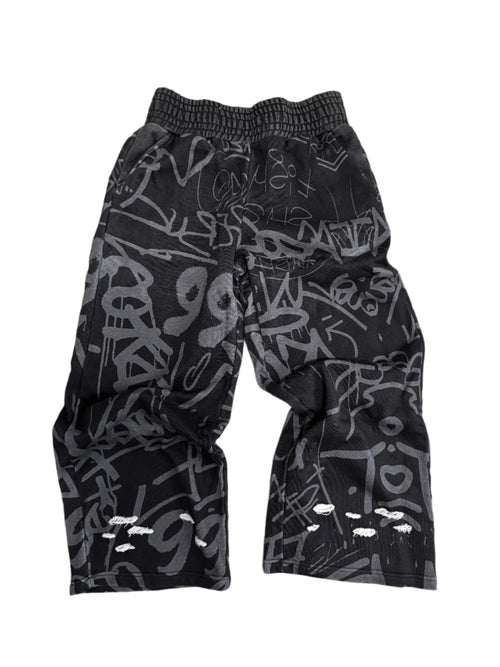 Black Vandalizm Sweats featuring graffiti print, made from 100% French Terry Cotton, ultra-heavyweight style.