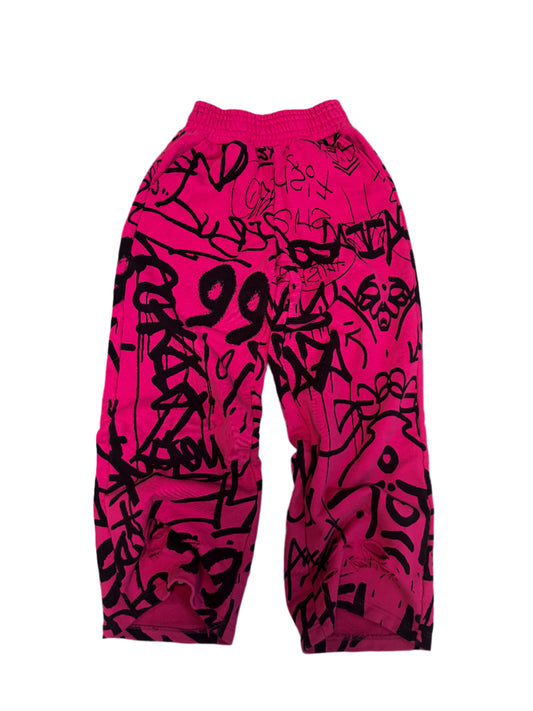 Pink Vandalizm Sweats featuring graffiti-style print, 100% French Terry Cotton, extra baggy fit.